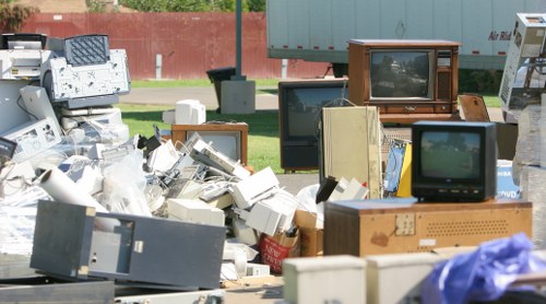 Different types of builders waste being sorted