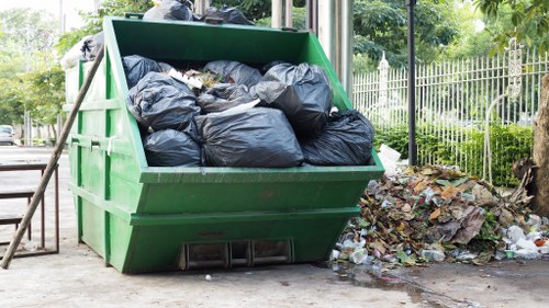 Sorting area at a local transfer station with labelled bins